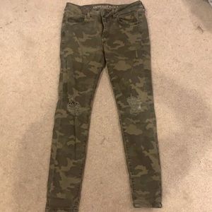 Slightly ripped camo jeans